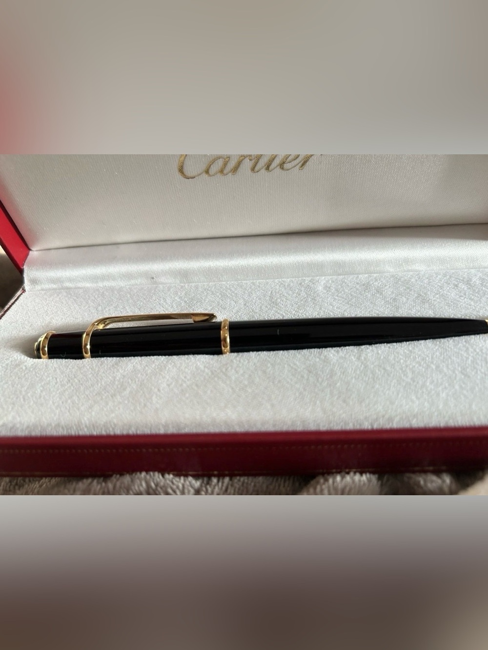 The Cartier Gold Ball Point Pen and Mechanical Pencil Set.